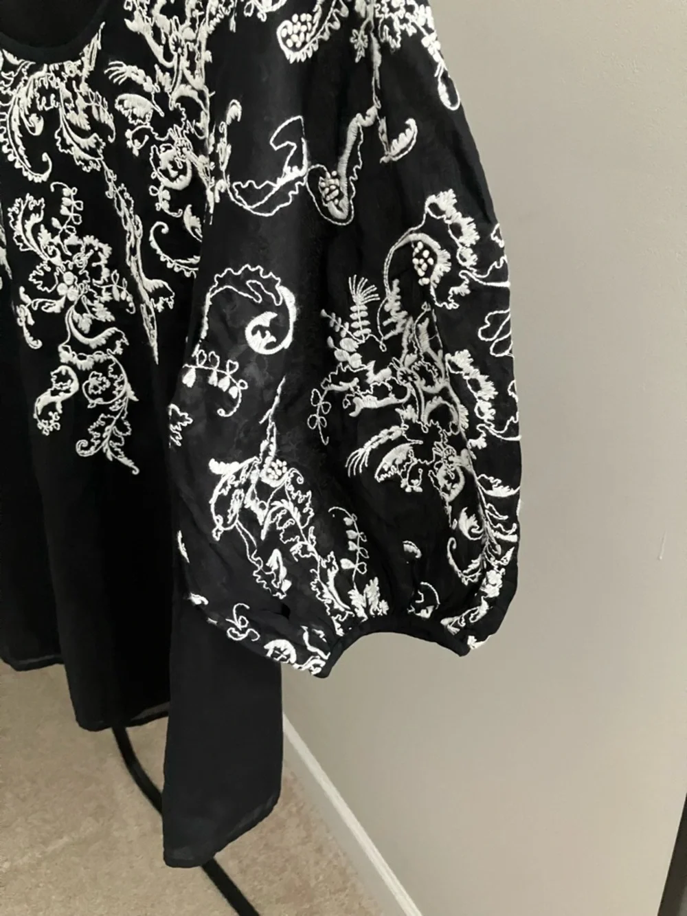 NWOT Anthropologie Black Top with White Floral Embroidery